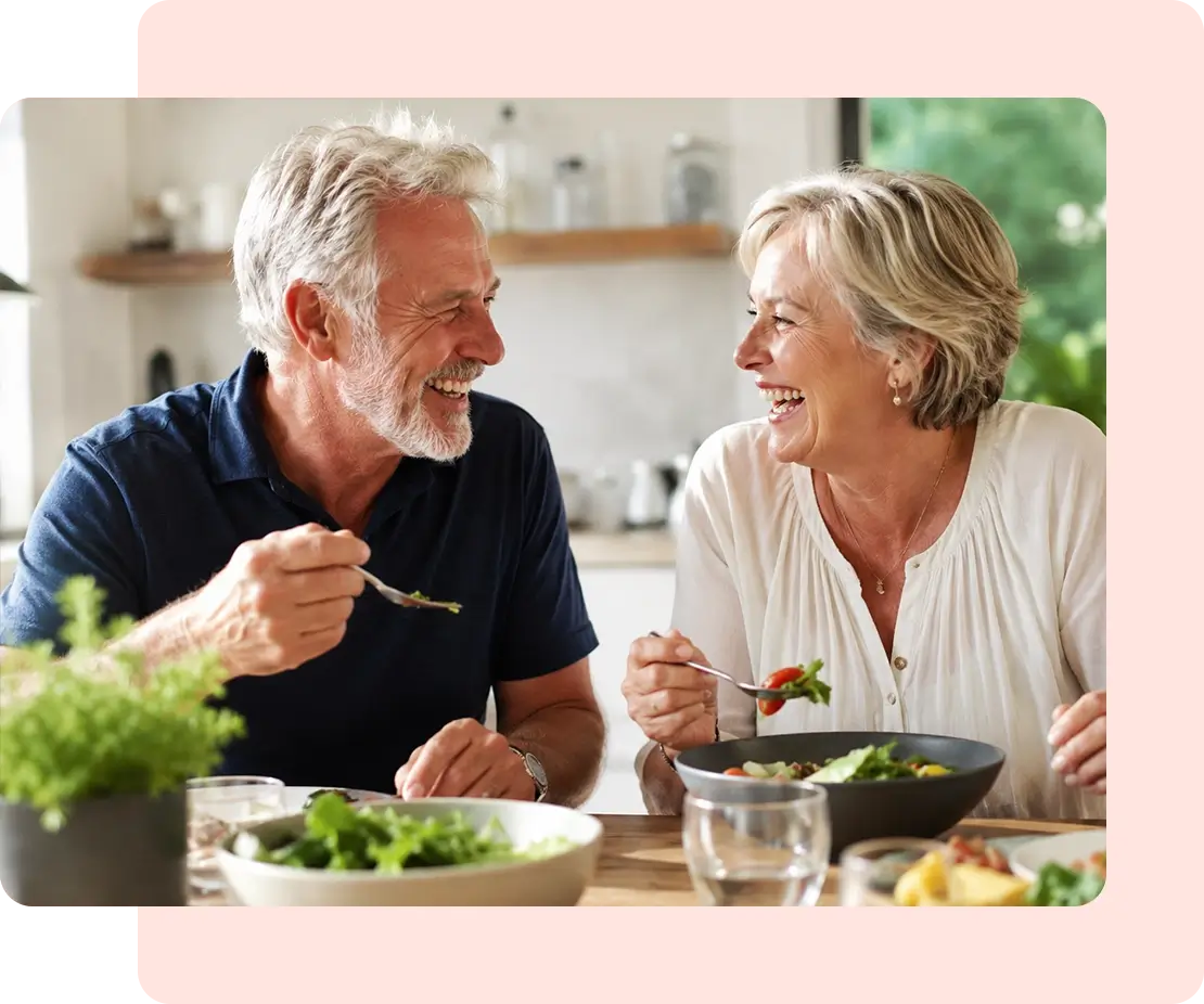 couple in their sixties enjoying a meal together