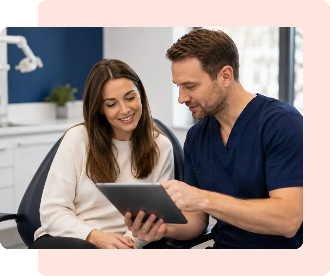 dentist reviewing patient plan with a patient